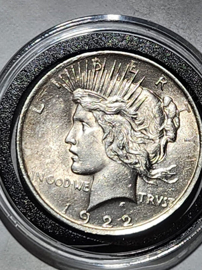 USA $1 Silver PEACE 90% 1922 with plastic holder.19W3M2