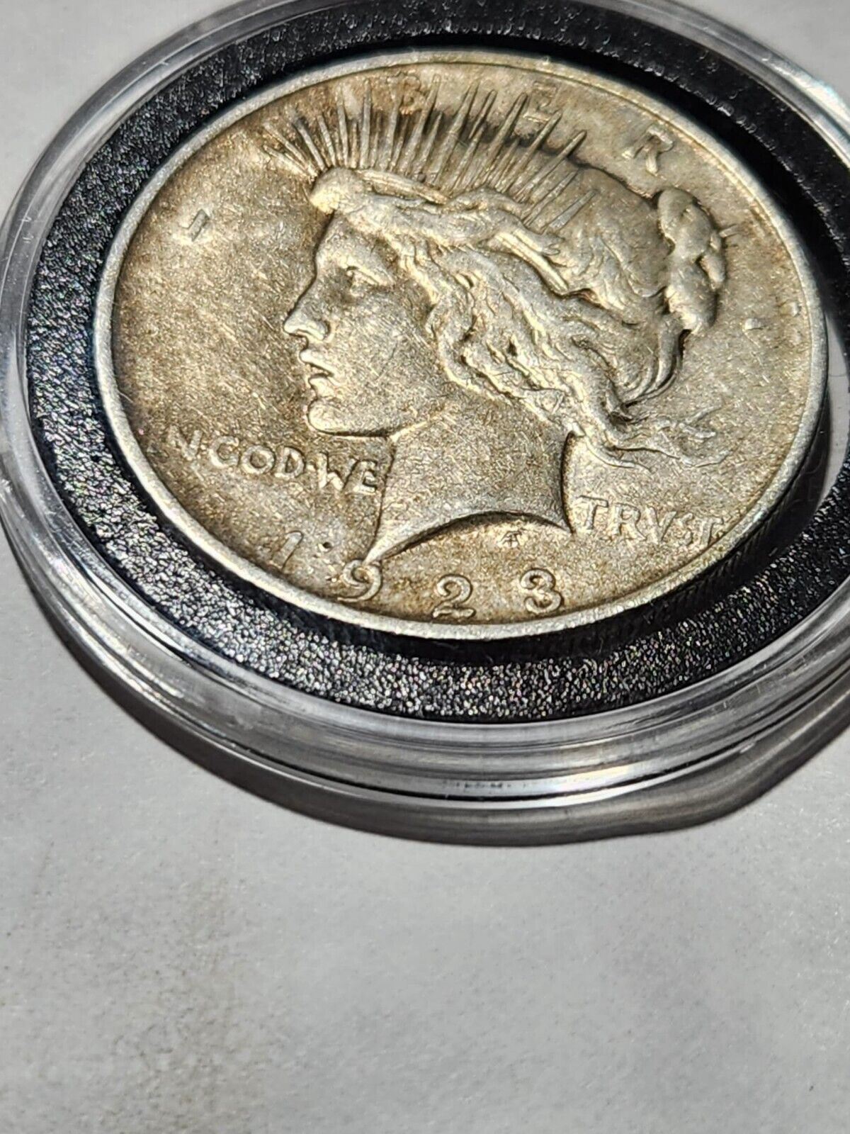 USA  $1 Silver PEACE 90% 1923D with plastic holder.19W3M1